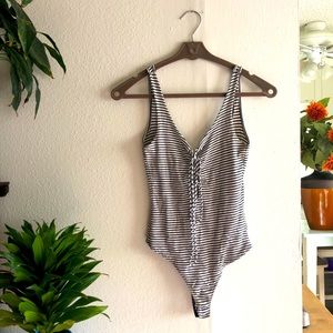 Black and White Stripped Body Suit Size Small